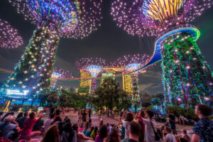 Tourists enjoying the Garden Rhapsody Light and Sound Show at Gardens By The Bay in Singapore